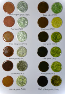 Figure 11: Light green transparent enamels applied directly on copper base and directly on pure silver foil.